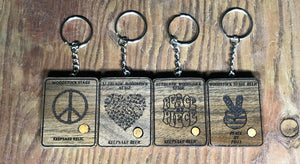 Hand Made Key Chains Including Piece of 1969 Woodstock Stage