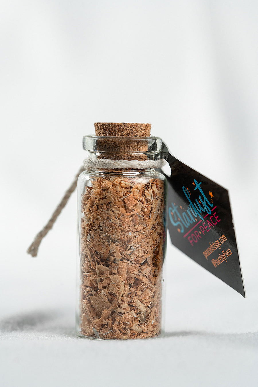 Glass Bottle Filled with Shavings and Sawdust from the Original 1969 Woodstock Stage Wood